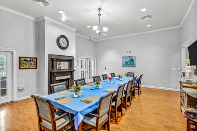 Bright dining room set for a meal with a large table