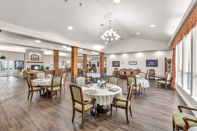 Dining room with tables set for residents