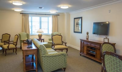Common area with seating and television