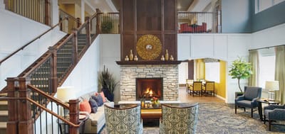 Bright and inviting living room area with a fireplace