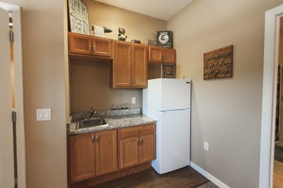 A cozy kitchenette area in a senior living unit
