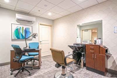 Beauty salon space with chairs and mirrors