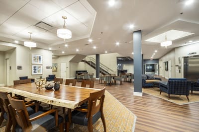 Bright, spacious common area with seating and decor