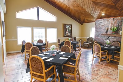 Dining room with tables set for meals