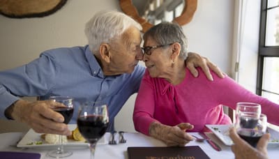 Two residents enjoying a meal and a moment together