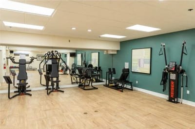 Interior view of a fitness room with exercise equipment