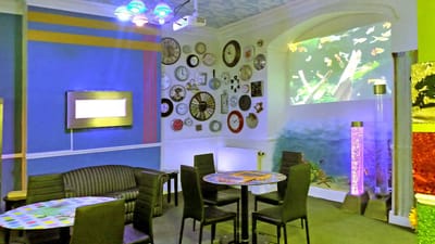 Vibrant common area with colorful decor and seating