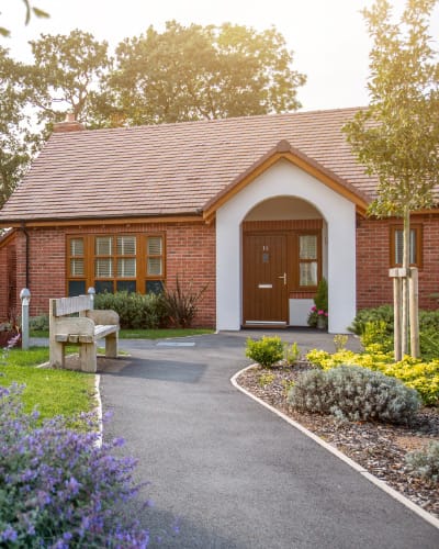 Exterior view of a welcoming assisted living facility