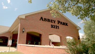 Exterior view of Abbey Park at Mill River building
