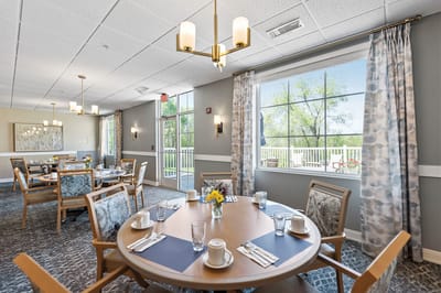 Bright dining area with tables set for meals