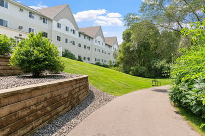 Pathway leading through a landscaped outdoor area