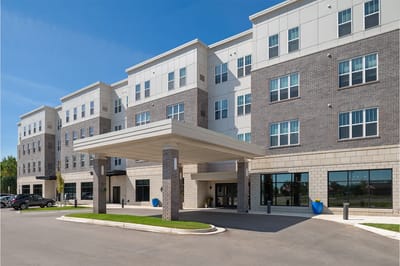 Front entrance of American House Meridian with covered entry