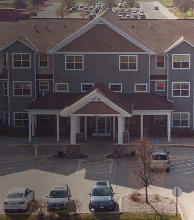 Exterior view of Arbor Oaks Senior Living building
