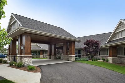 Entrance of American House Jenison with a covered drive