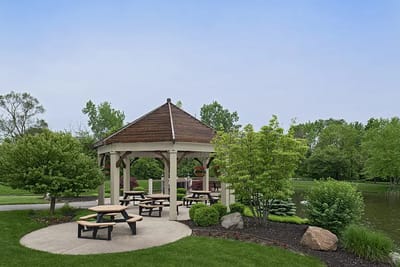 Covered gazebo in a serene outdoor garden