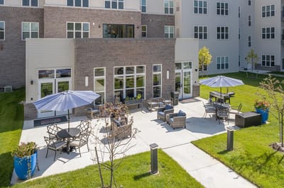 Outdoor seating area with umbrellas and chairs