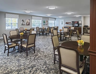 Interior dining area with tables and chairs