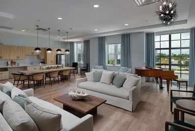 Bright common area with seating and natural light