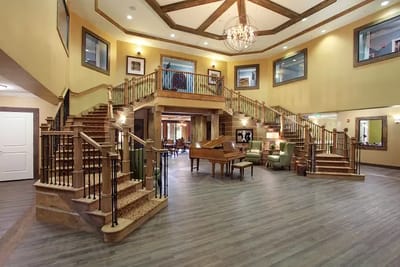 Interior view of a spacious common area with staircase