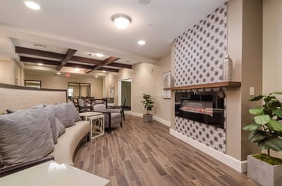 Cozy common area with a fireplace and seating