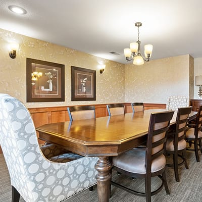 Bright dining room with a large table and seating