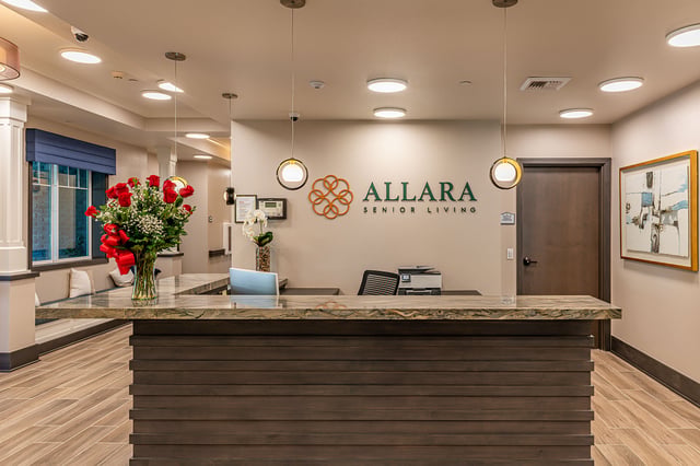 Reception area at Allara Senior Living with flowers