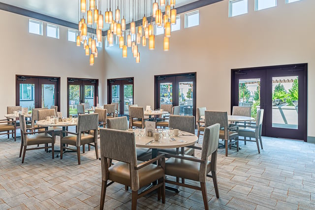 Dining area with tables set for meals