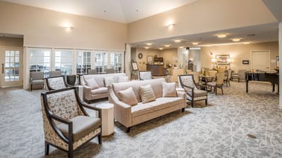 Lounge area with seating in a well-lit common space