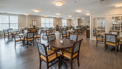 Bright dining area with tables and chairs