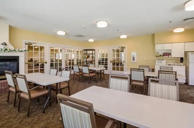 Interior view of a common area with tables and chairs