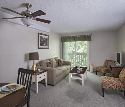 Cozy interior of a resident room with furniture and a view