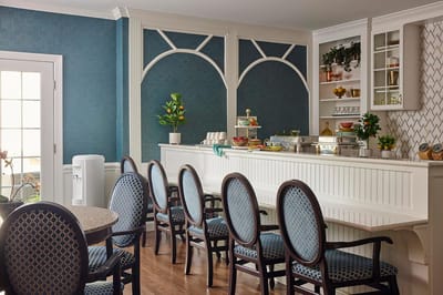 Modern dining area with elegant seating and decor