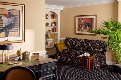 Comfortable lounge area with art and plants