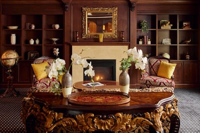 Cozy common area with elegant furnishings and fireplace