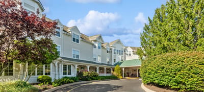 Exterior view of Woodbridge Place with landscaping