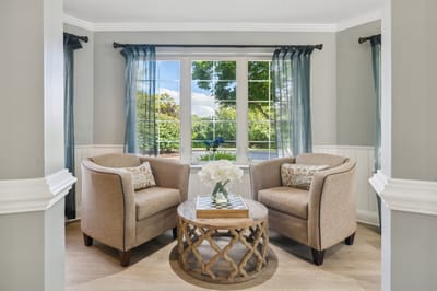 Cozy lounge area with chairs and a coffee table