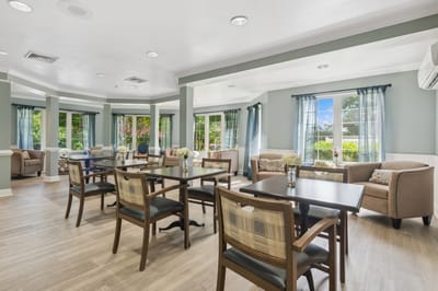 Bright common area with seating and natural light