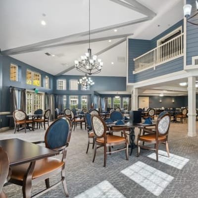 Bright dining area with tables and chairs