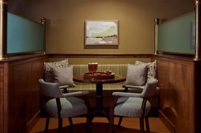 Cozy seating area in a common room with snacks and drinks