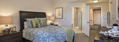 Cozy resident room with bed and bathroom