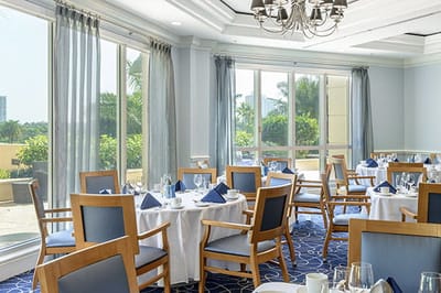 Dining area with tables set for meals
