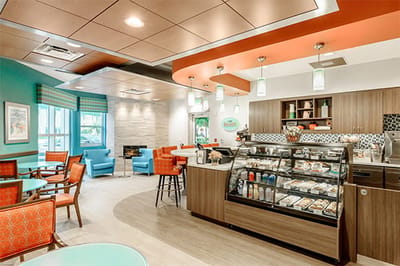 Bright and welcoming common area with seating and decor
