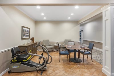 Common area with seating and exercise equipment