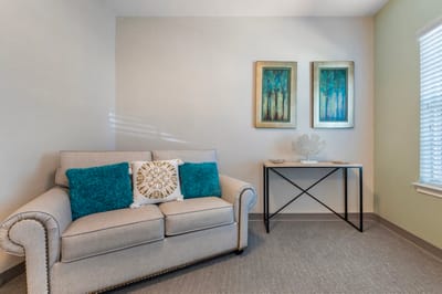 Cozy seating area with decor in a senior living facility