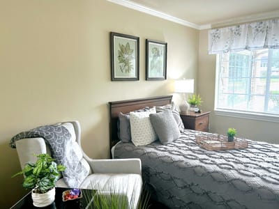 Cozy private bedroom with bed and decor