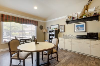Interior of a common area with a round table and decor