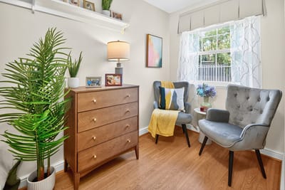 Cozy interior of a resident's room with furniture