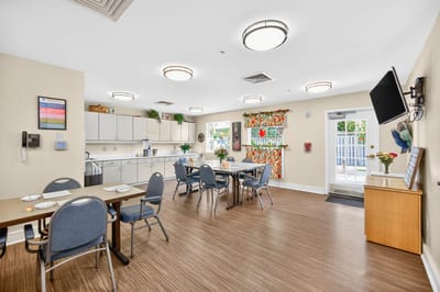 Bright dining area with tables and chairs