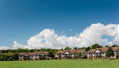 Exterior view of Westbury Fields Retirement Village with gardens