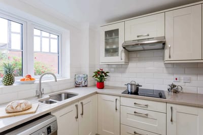 Interior view of a bright kitchen with modern appliances